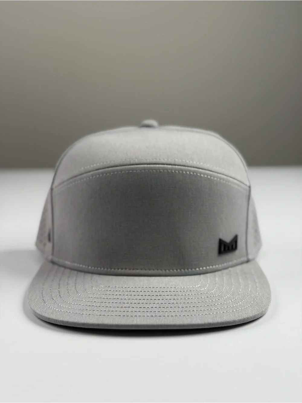 Melin Trenches Icon Hydro Performance Snapback Hat in Heather Grey, Classic